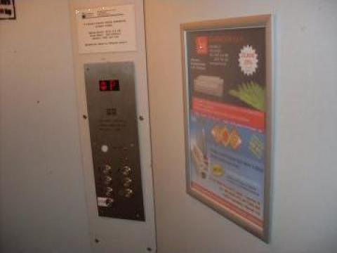 Rame publicitate in lift de la Evia Media